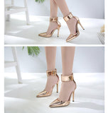 shiny pointed high heel shoes