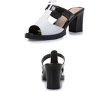 Black and white slipper sandals