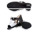 Black and white slipper sandals