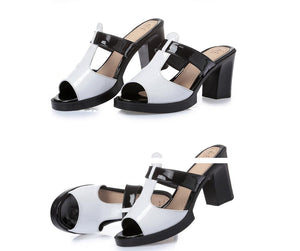 Black and white slipper sandals